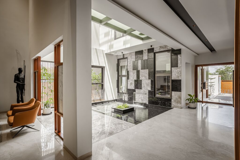 About us Open-air courtyard design for a contemporary home in Madurai